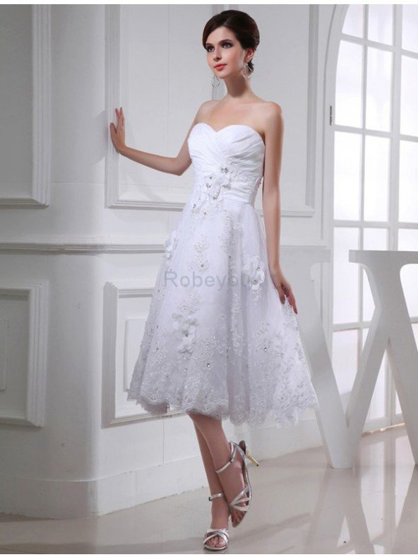 Robe de mariée fermeutre eclair avec perle en organza textile taffetas manche nulle