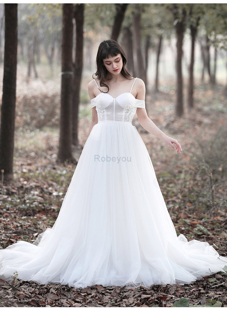 Robe de mariée au jardin chaming ligne a solennelle romantique