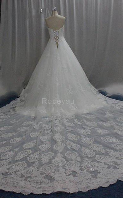 Robe de mariée ligne a textile taffetas fermeutre eclair sans dos col en forme de cœur