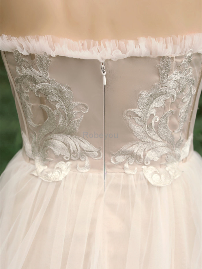 Robe de mariée textile en tulle en plage charme romantique attirent