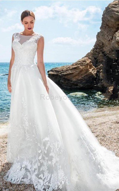 Robe de mariée au bord de la mer avec zip de traîne courte decoration en fleur avec bouton