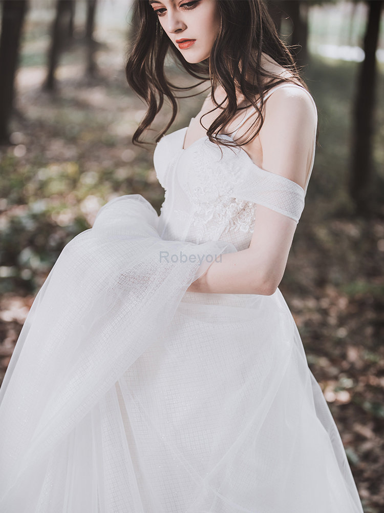 Robe de mariée au jardin chaming ligne a solennelle romantique